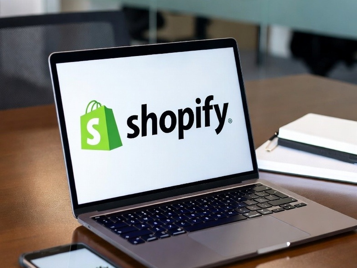 Business professionals in New York discussing Shopify development strategies to build a successful ecommerce store.