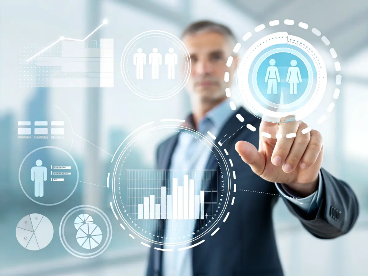 Business professional interacting with a futuristic digital interface displaying analytics, workforce icons, and data visualizations.